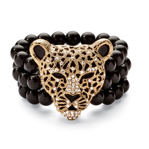 PalmBeach Jewelry Onyx and Crystal Leopard Stretch Bracelet in Yellow Gold Tone